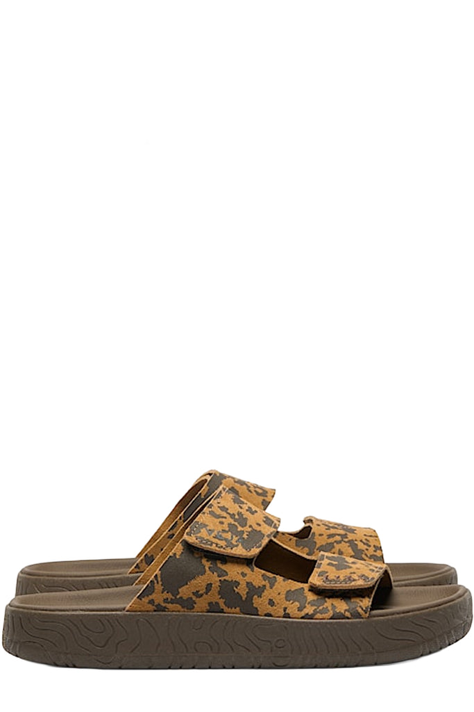 A pair of Veja sandals in brown with dark brown patterns made from leather shown against a plain white background.