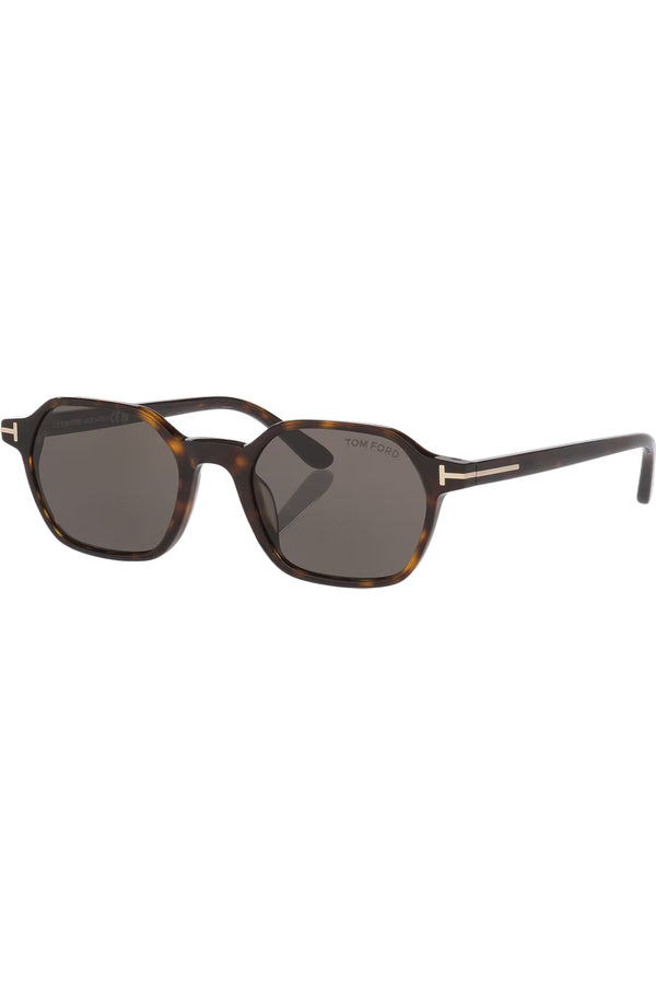 Rotated view of Tom Ford rectangular sunglasses in gray with tortoiseshell frame and golden T details, shown against a plaid white background.