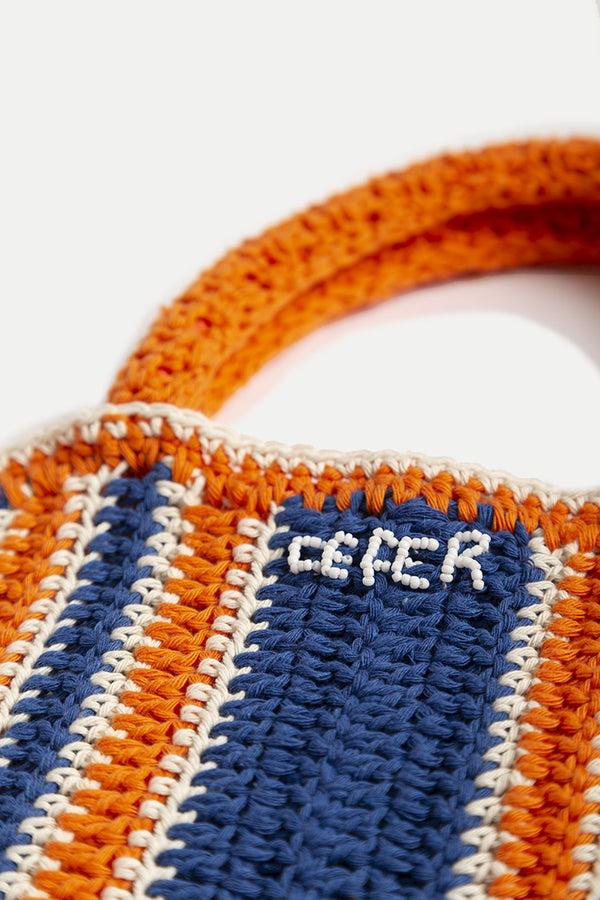 The Homero handmade woven totebag in orange color from the brand CEFÉR