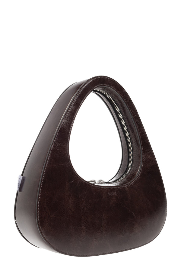 The Baguette Swipe leather bag in the colour brown from the brand COPERNI