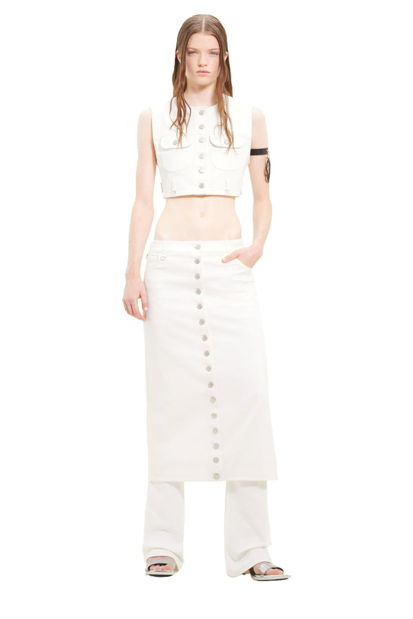 Model wearing the Multiflex Denim Skirt in white colour from the brand COURRÈGES