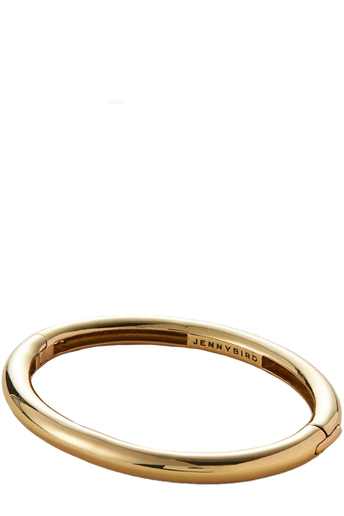 The Gia bangle bracelet in gold colour from the brand JENNY BIRD