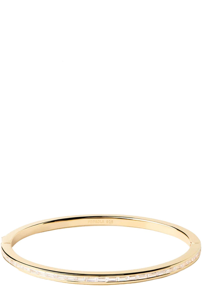 The Viena Bangle bracelet in gold and clear colours from the brand P D PAOLA