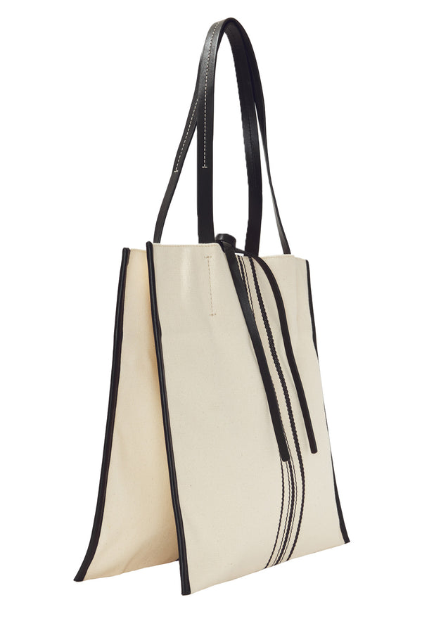 The Twin striped Canvas tote bag in natural and black colors from the brand PROENZA SCHOULER