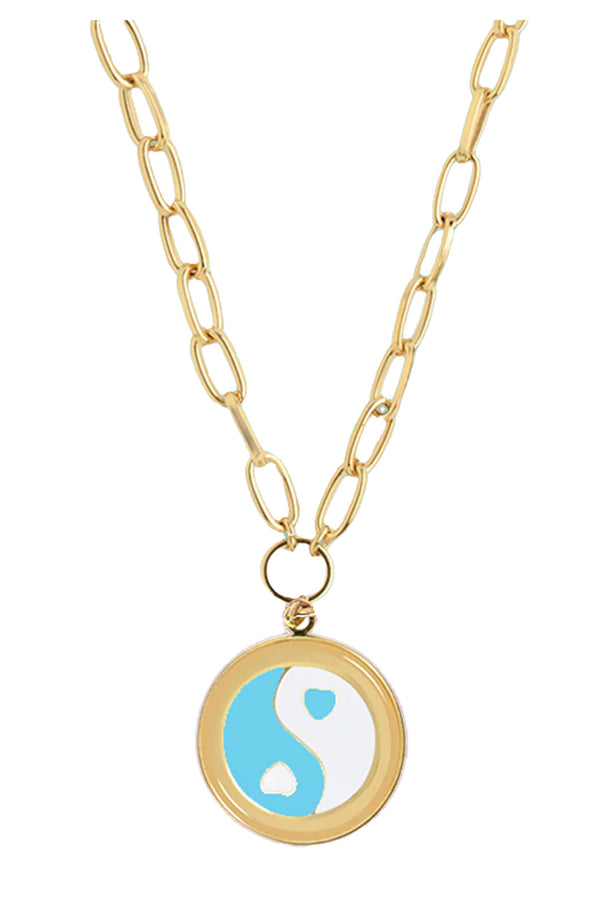 The Yin/Yang necklace in gold and blue colors from the brand WILHELMINA GARCIA